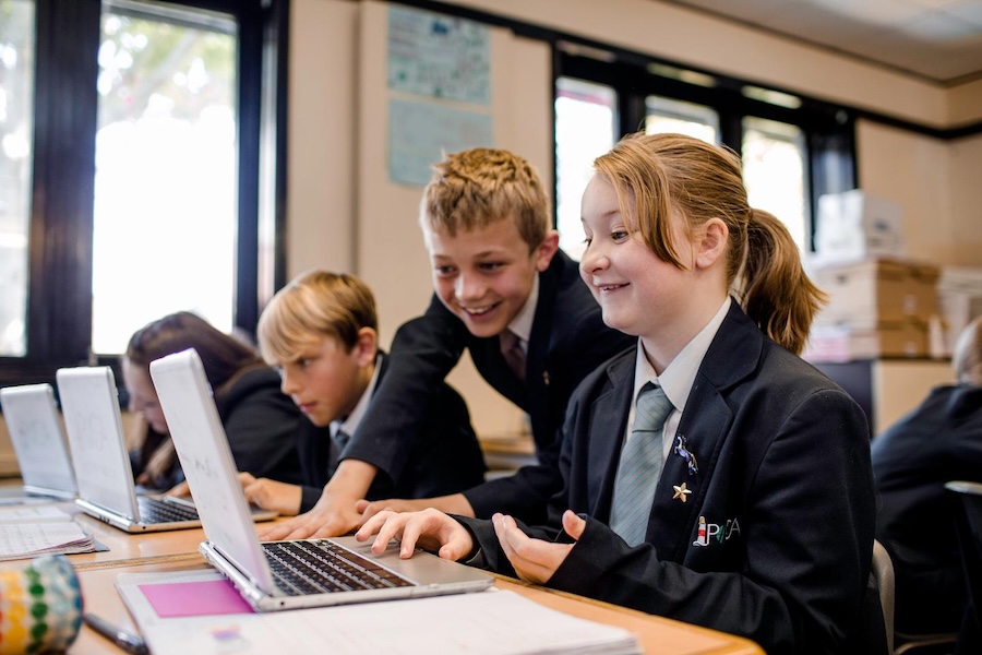 students using chromebooks in school students using chromebooks in school