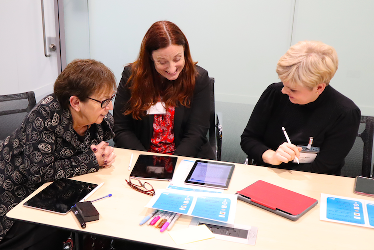 a group of school leaders planning for digital learning in school a group of school leaders planning for digital learning in school